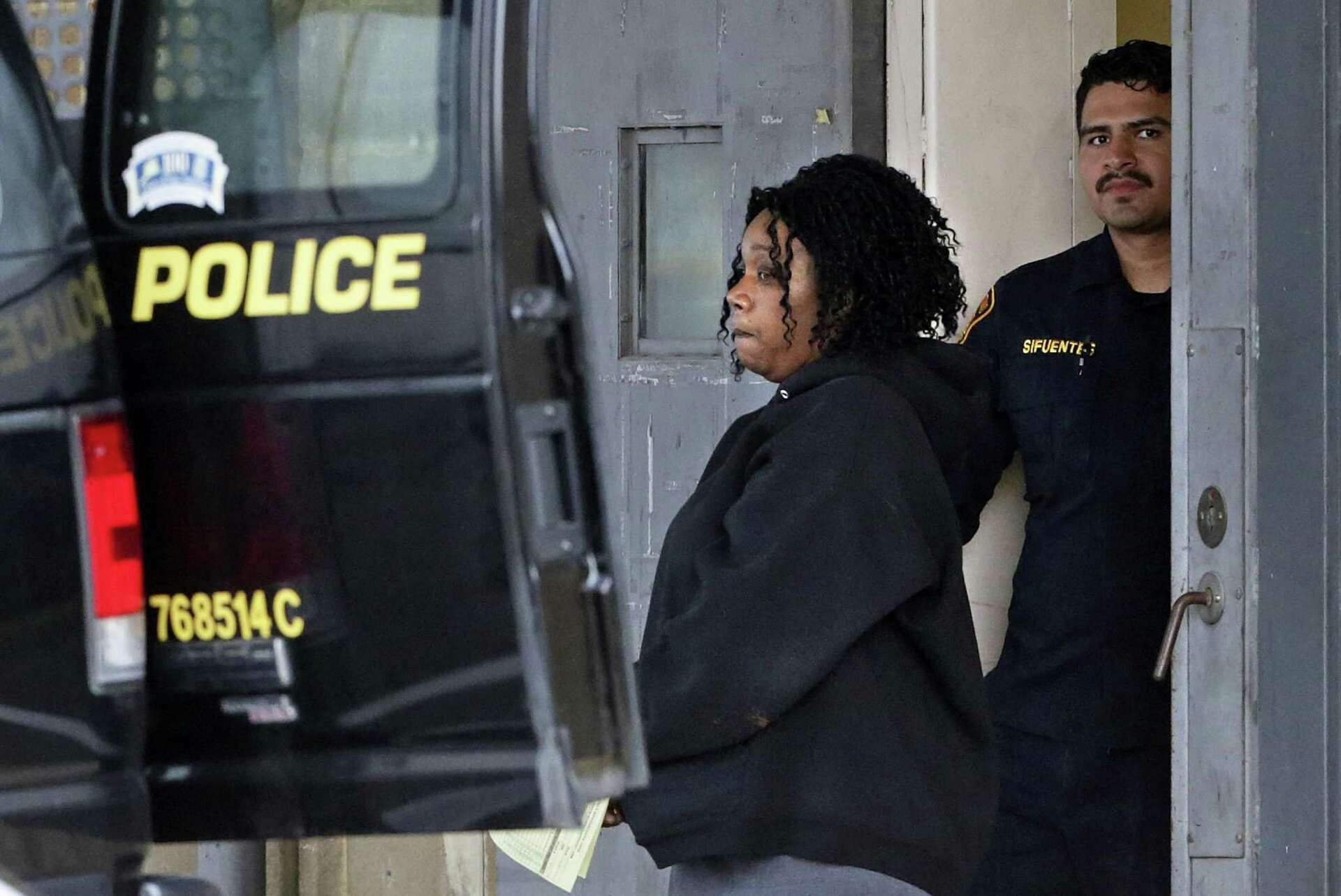 Mother of 6 arrested after children found chained up outside home ...